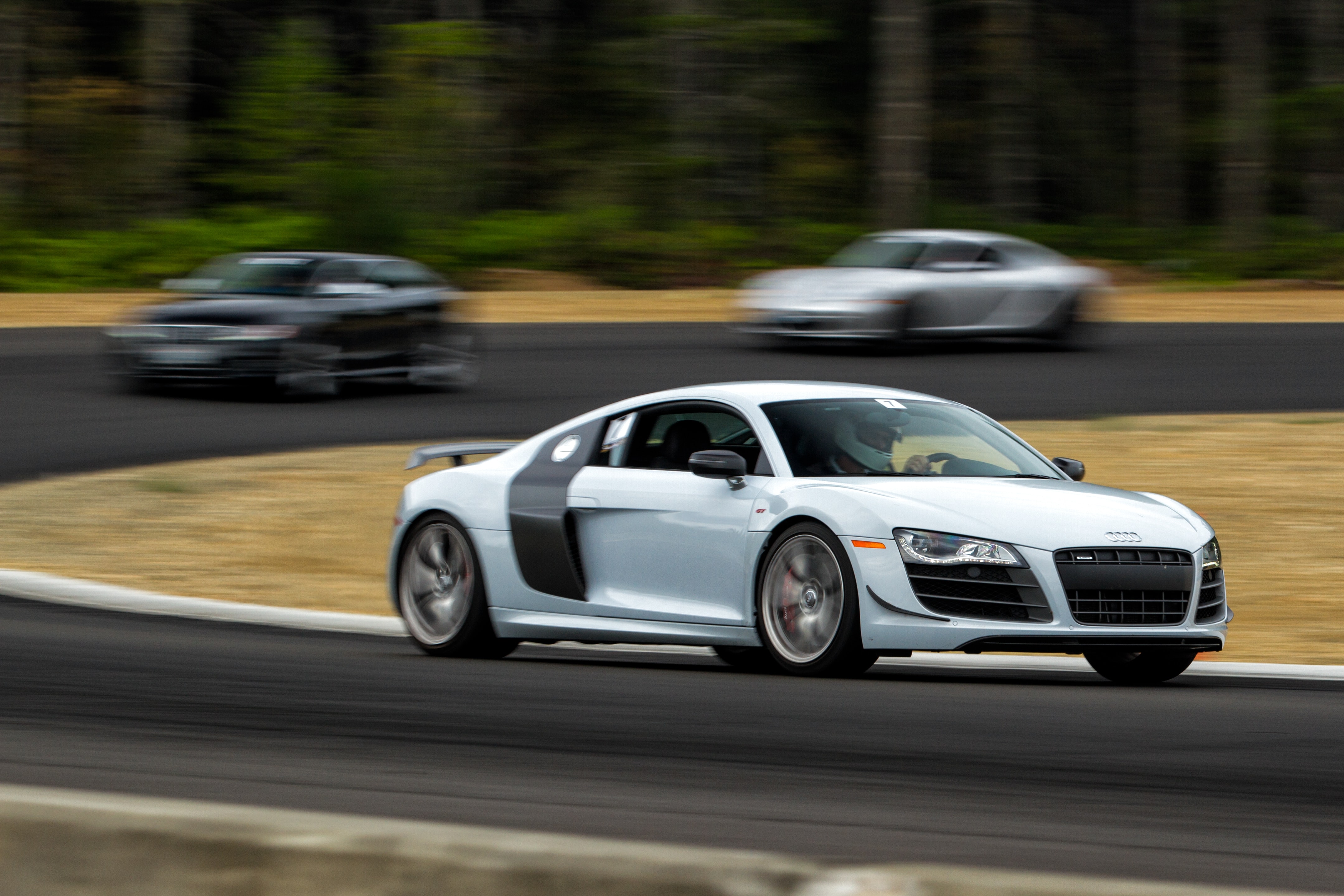white audi racing other cars on track